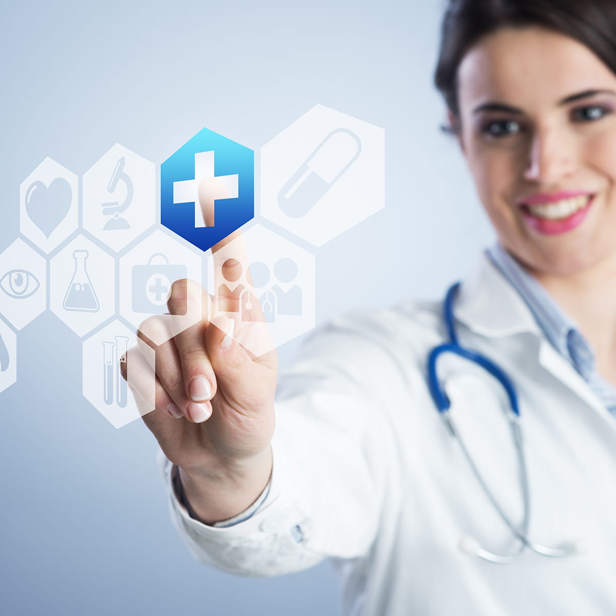 Healthcare worker clicking on digital screen