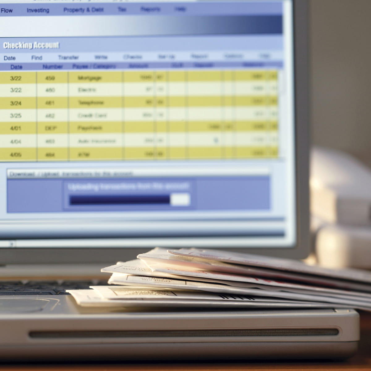 Files in front of a computer screen