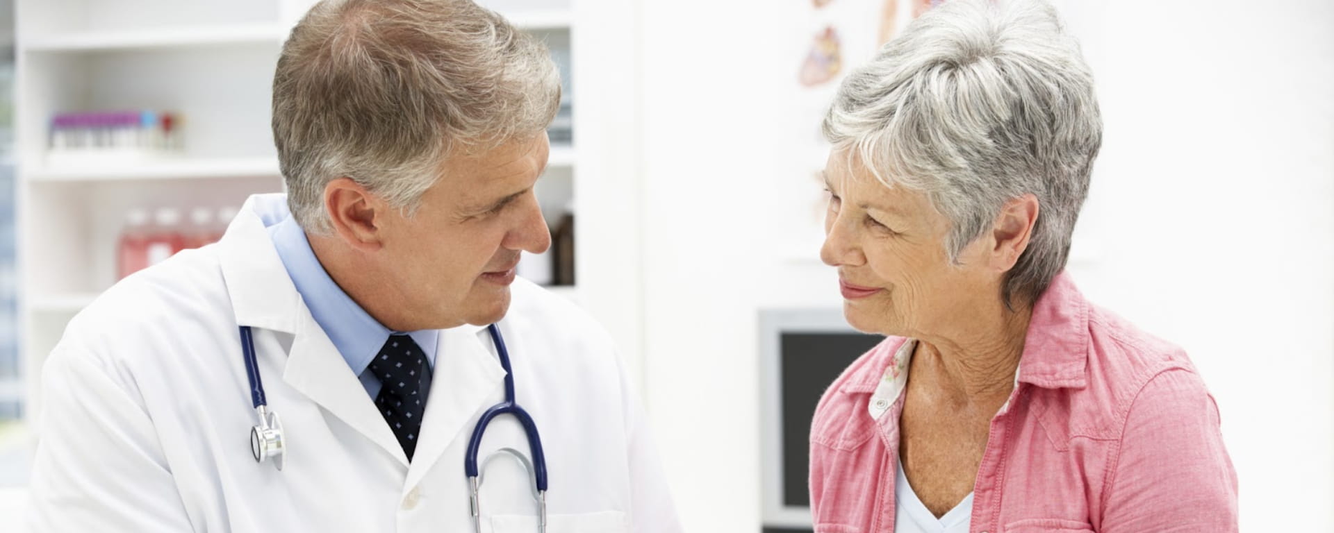 Doctor sitting with a patient